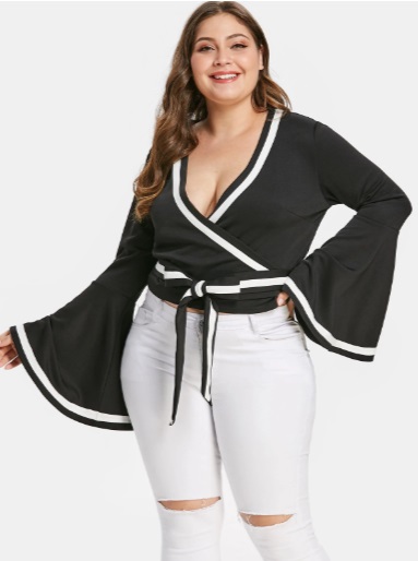 most appealing color combination of black blouse paired with white jeans